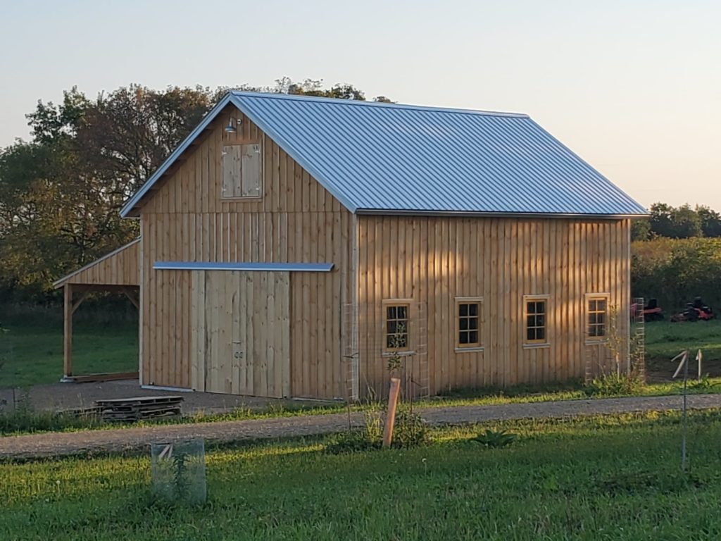 New barn construction using locally sourced timber.